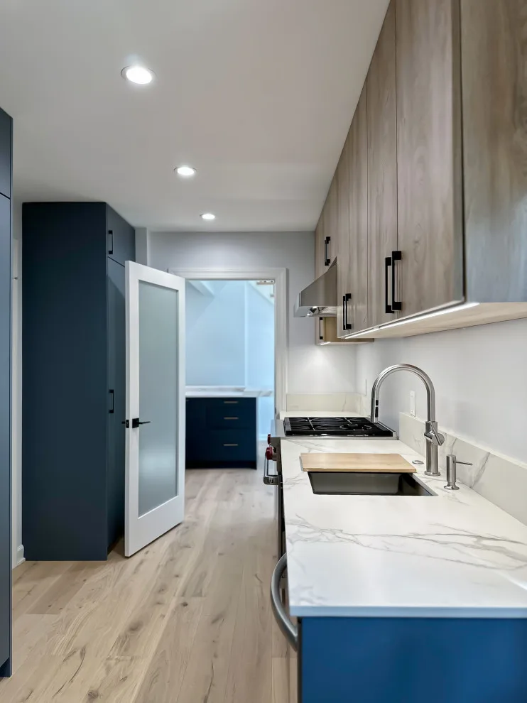 Navy and White Kitchen Design with a Transitional Style by UCS Kitchen Design - Photo 21