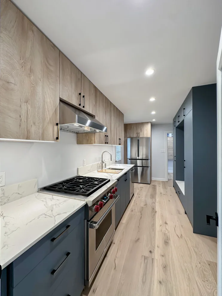 Navy and White Kitchen Design with a Transitional Style by UCS Kitchen Design - Photo 17