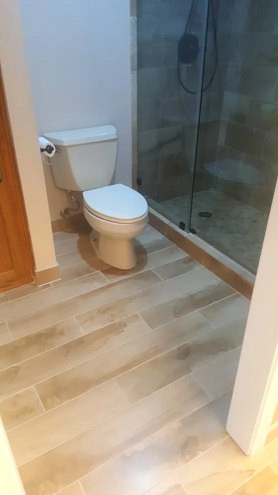 Travertine Restrooms by Zendo Renovations - Photo 3