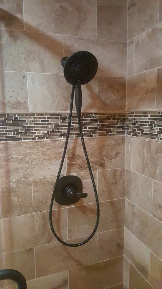 Travertine Restrooms by Zendo Renovations - Photo 7