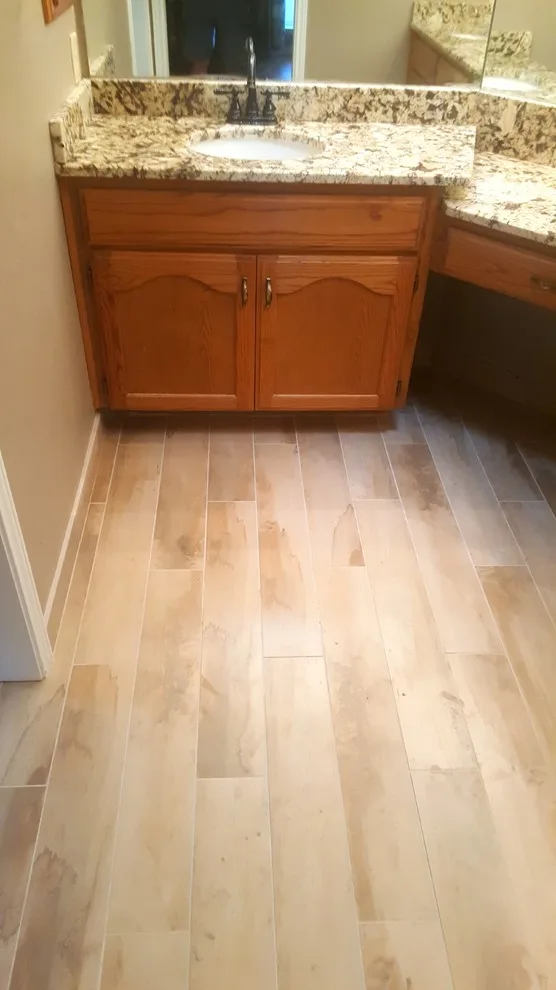 Travertine Restrooms by Zendo Renovations - Photo 5