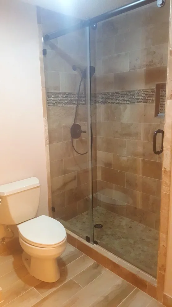 Travertine Restrooms by Zendo Renovations - Photo 4