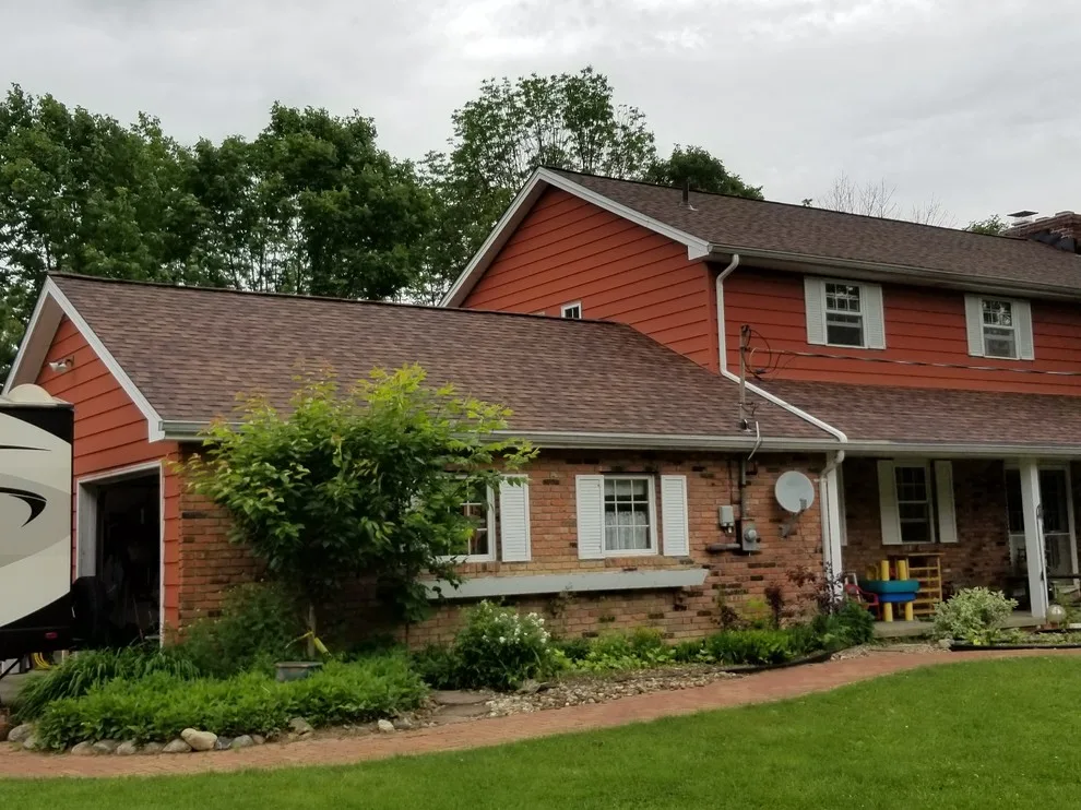 Trust - Roofing Clients' Homes for the Second Time in 27 Years by Medina Exteriors & Remodeling - Photo 2