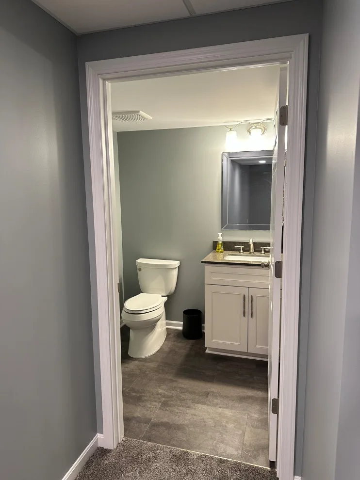 Distinctive Workspace Basement Area by Medina Exteriors & Remodeling - Photo 7