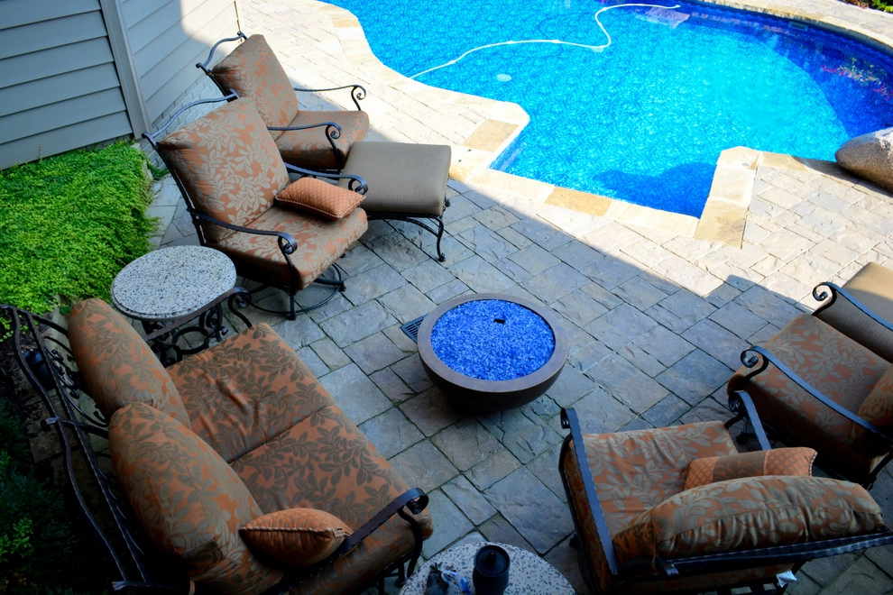 Innovative Pool Patio by Breaking Ground - Photo 25