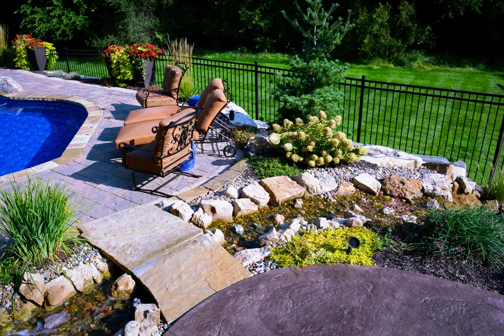 Innovative Pool Patio by Breaking Ground - Photo 16