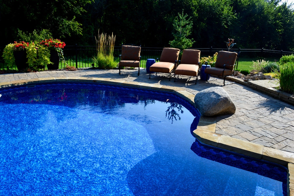 Innovative Pool Patio by Breaking Ground - Photo 26