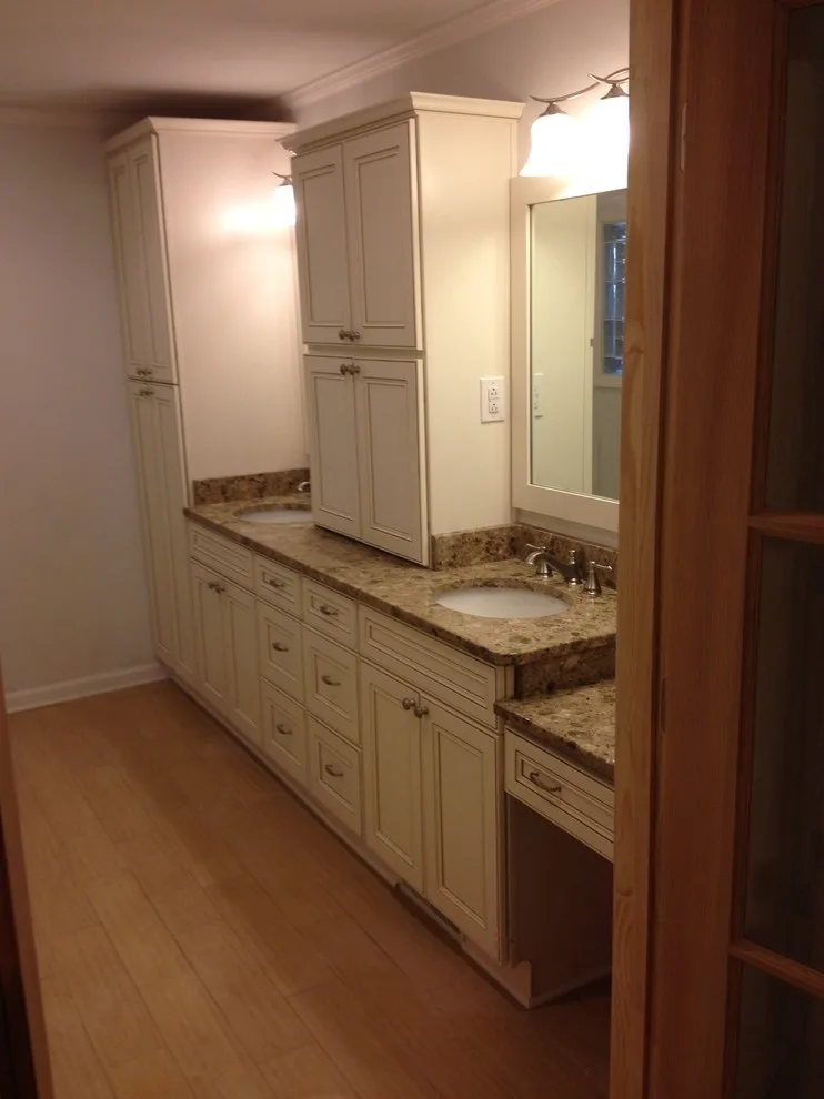 Vanity, countertops, lobby flooring, and shower area by Granite Marble Products - Photo 2