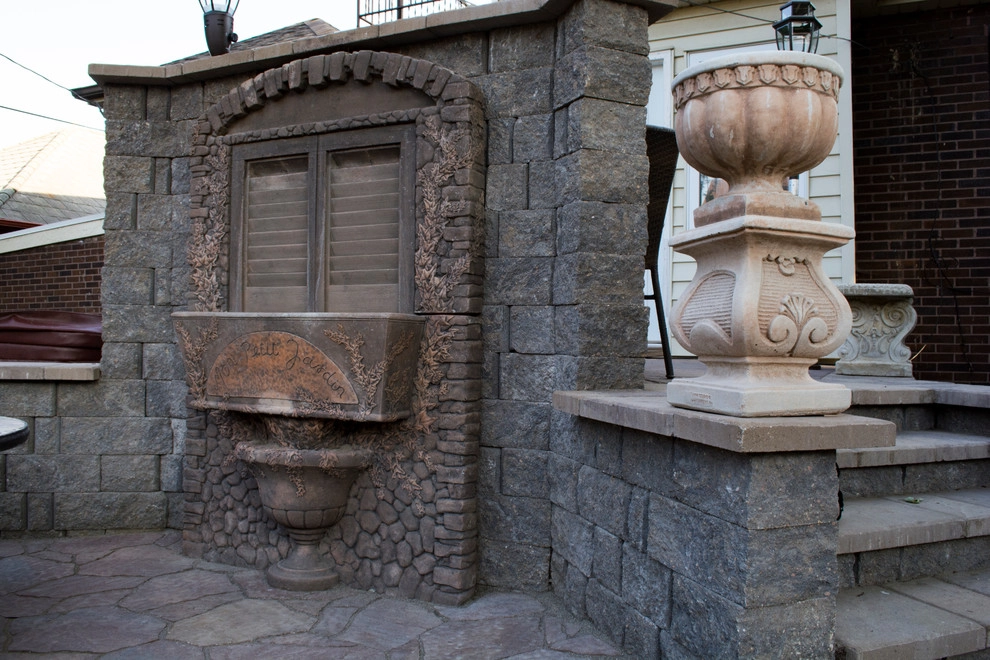 Natural Stone and Statue Garden by Breaking Ground - Photo 15