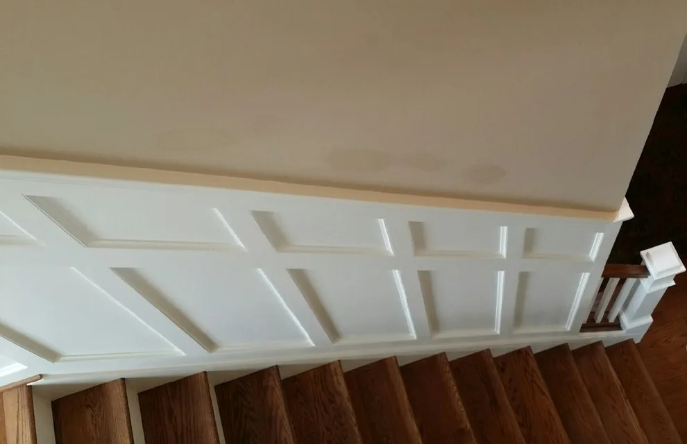 Staircase with Wainscot Paneling by Straight Edge Construction Group - Photo 3
