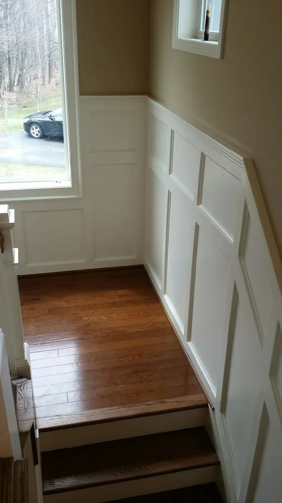 Staircase with Wainscot Paneling by Straight Edge Construction Group - Photo 4