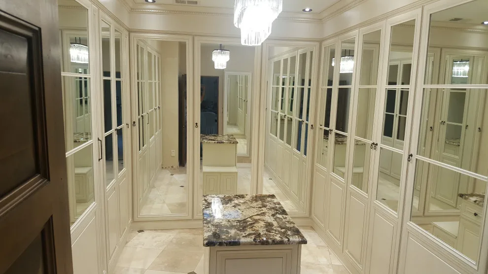 Wardrobe Room by Enchantment Design & Remodeling, LLC - Photo 4