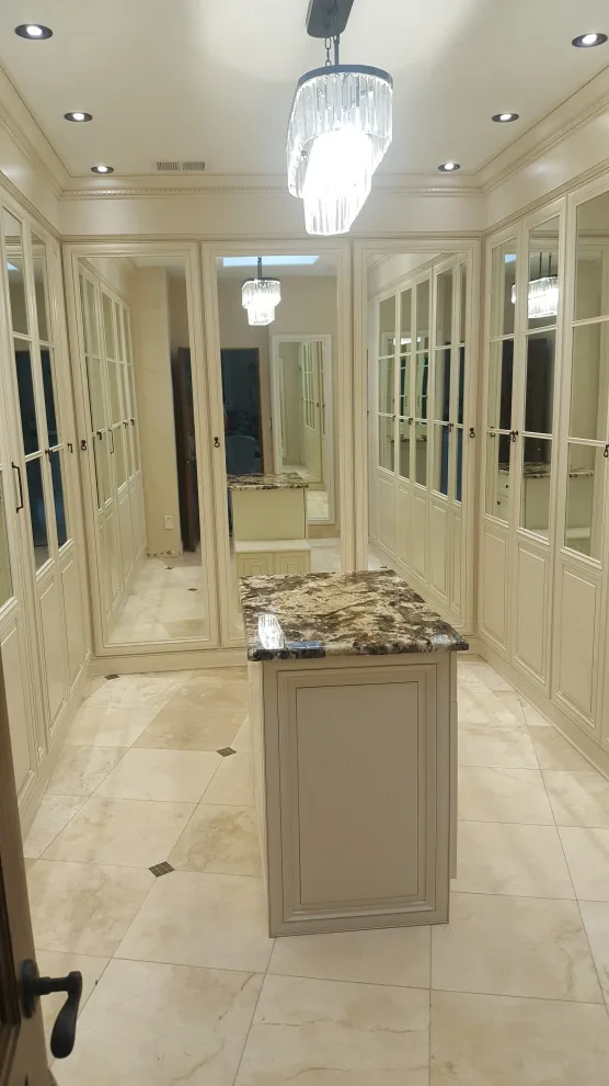 Wardrobe Room by Enchantment Design & Remodeling, LLC - Photo 5