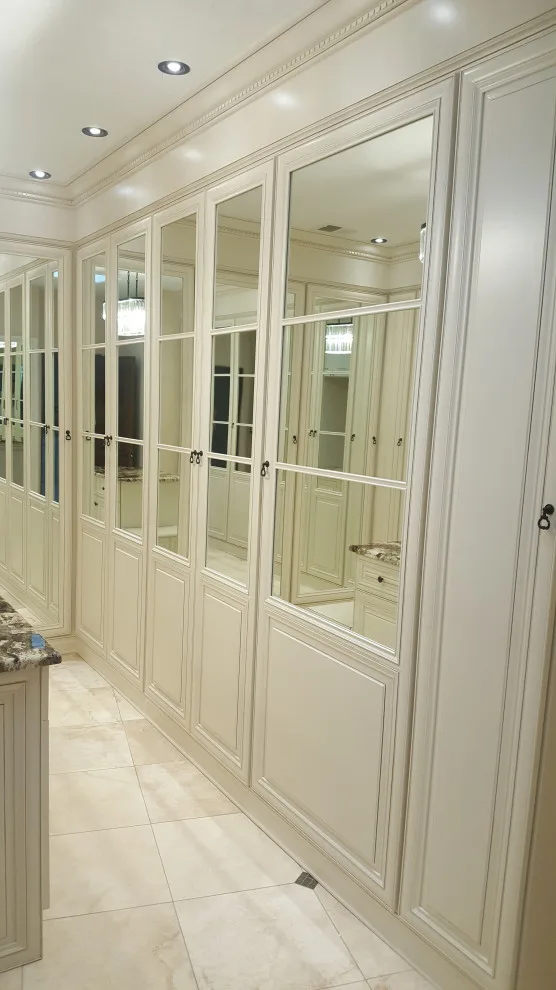 Wardrobe Room by Enchantment Design & Remodeling, LLC - Photo 3