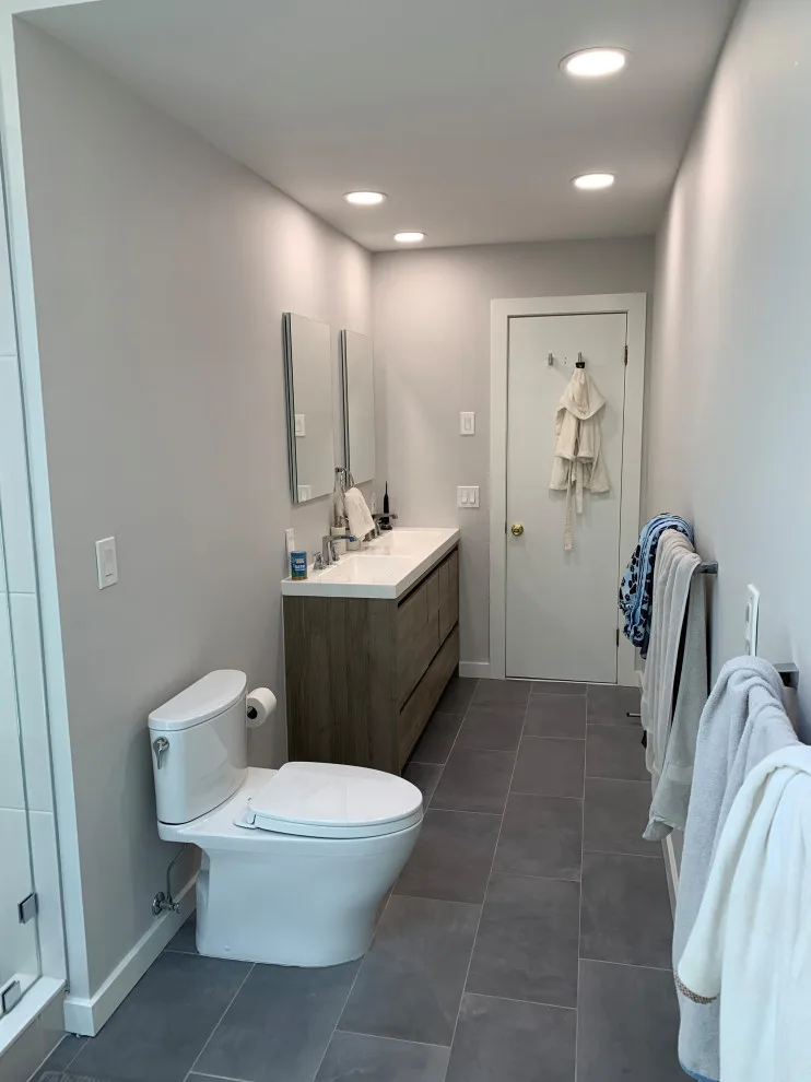 Contemporary Bathroom Renovation by K & M Flooring-Renovations Inc. - Photo 2