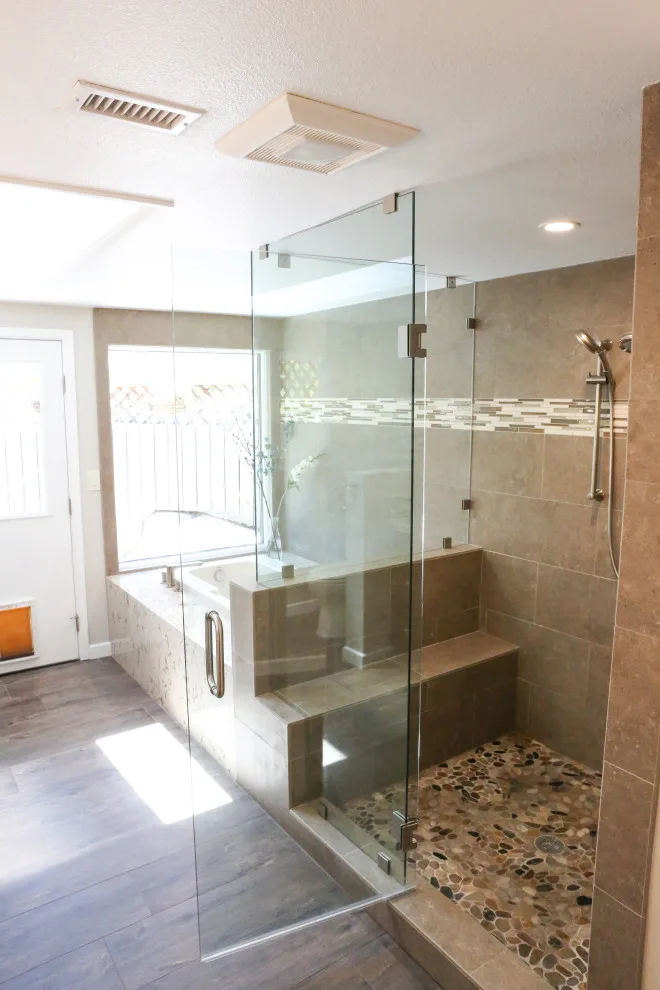 Cozy Bathroom with Spacious Vanity by Kaminskiy Design And Remodeling - Photo 8