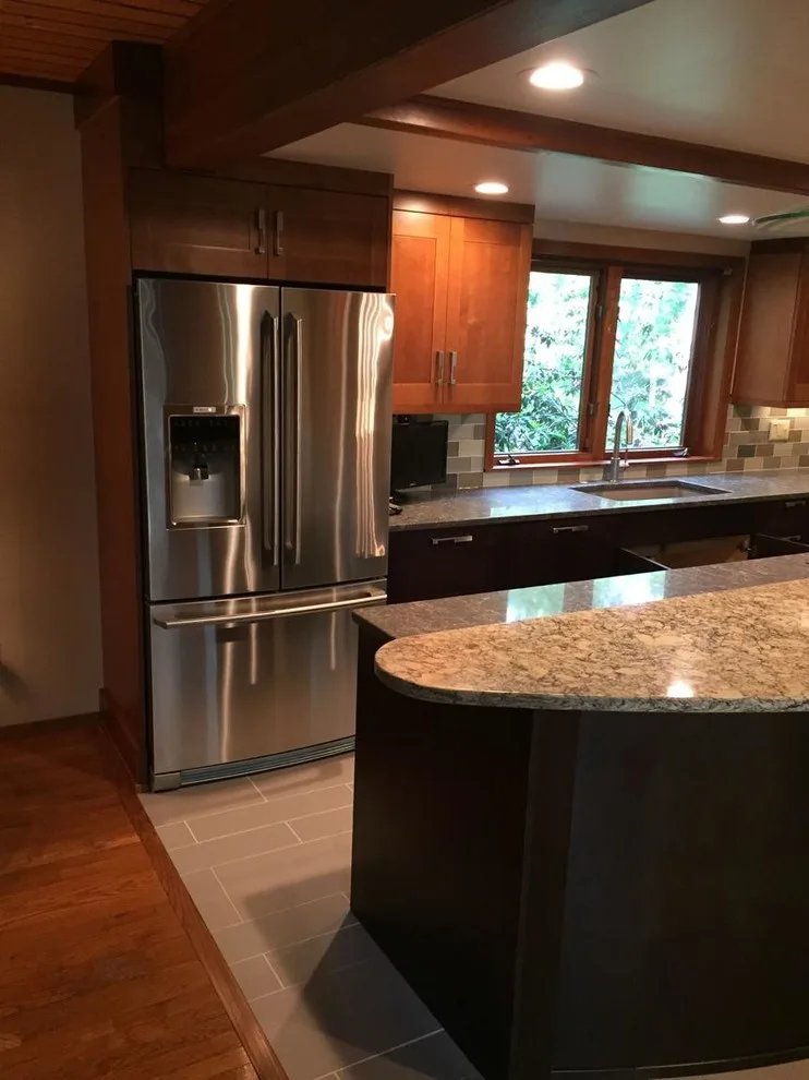 Cozy Kitchen Featuring a Spacious Island by North Shore Kitchen Design Center - Photo 4