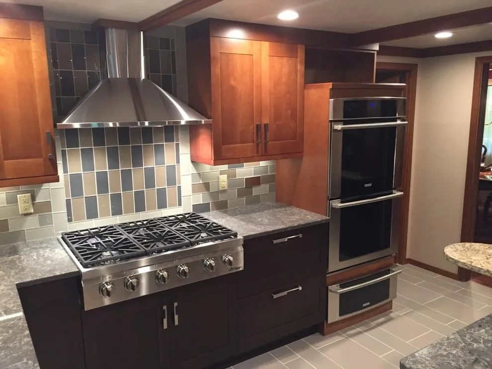 Cozy Kitchen Featuring a Spacious Island by North Shore Kitchen Design Center - Photo 6