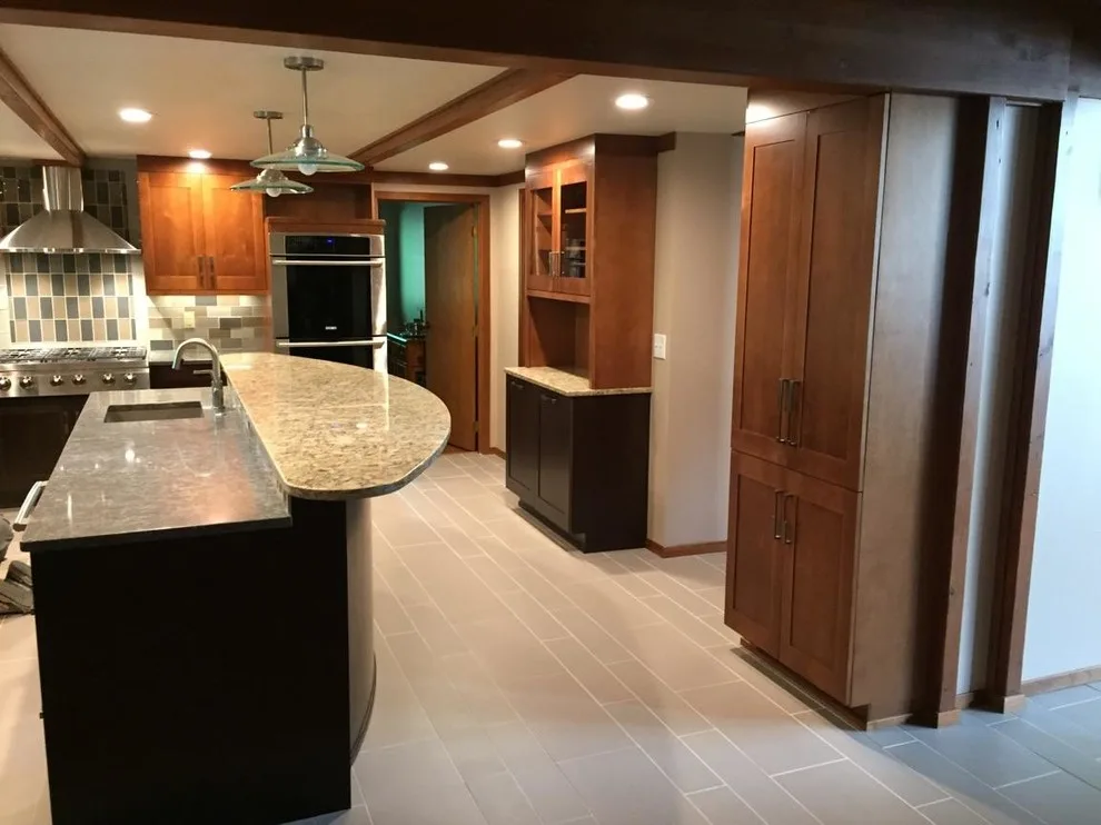 Cozy Kitchen Featuring a Spacious Island by North Shore Kitchen Design Center - Photo 3