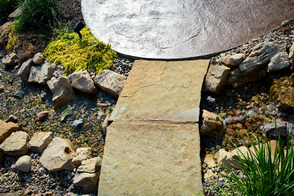 Innovative Pool Patio by Breaking Ground - Photo 10