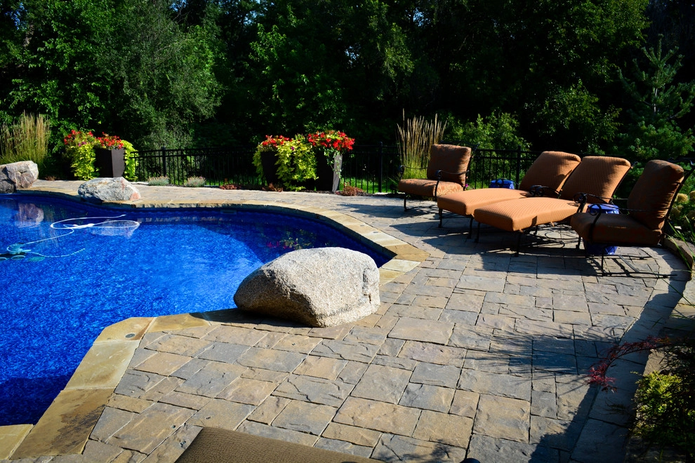 Innovative Pool Patio by Breaking Ground - Photo 21