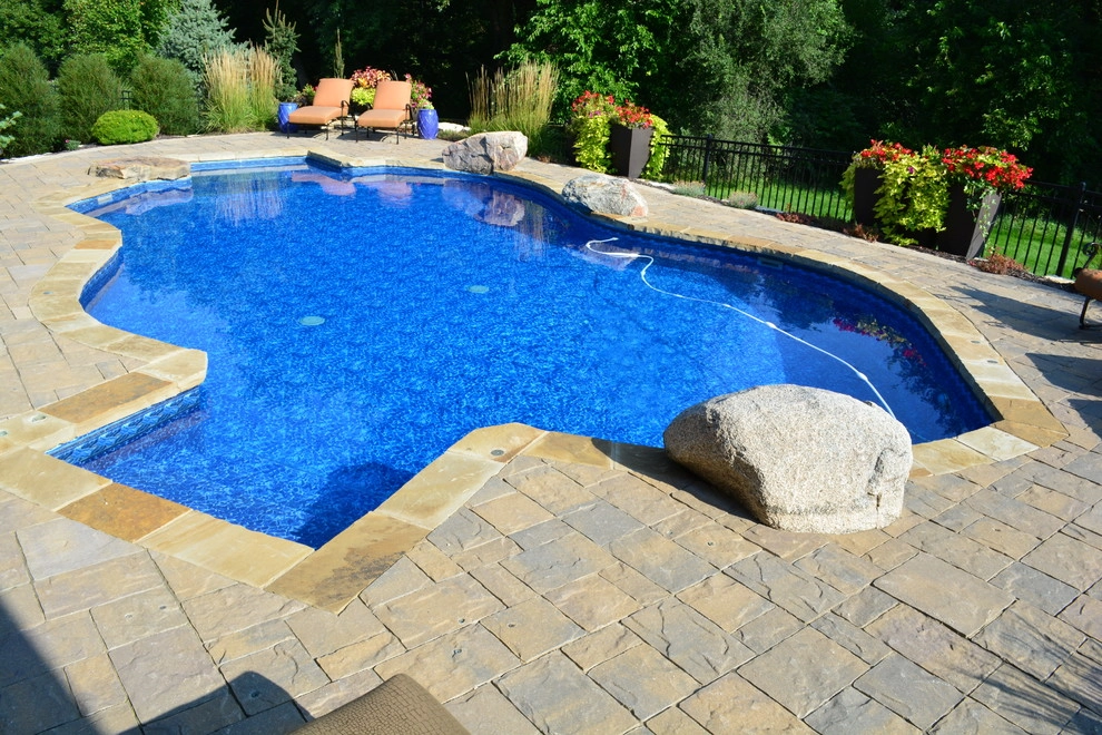 Innovative Pool Patio by Breaking Ground - Photo 27