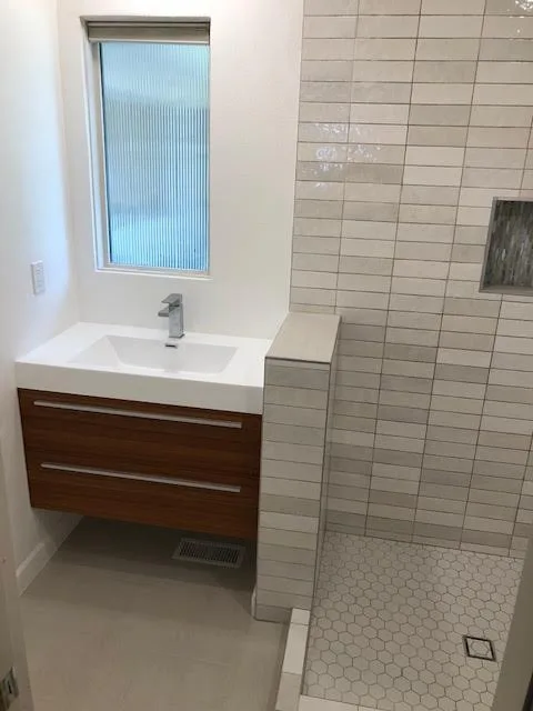 White-Themed Bathroom Renovations by ER Renovation, Inc. - Photo 4