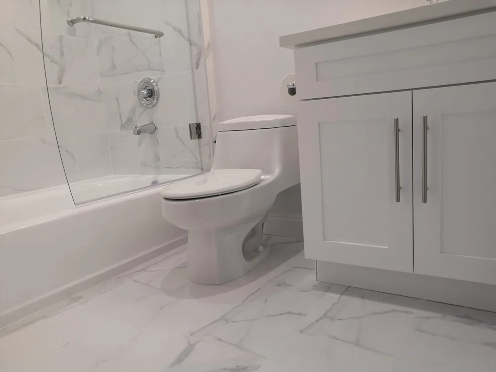 Sherman Oaks CA White Bathroom Renovation by California Kitchen Gallery - Photo 7