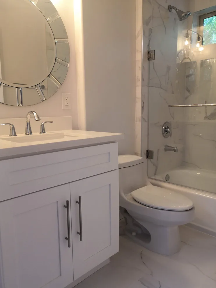 Sherman Oaks CA White Bathroom Renovation by California Kitchen Gallery - Photo 2