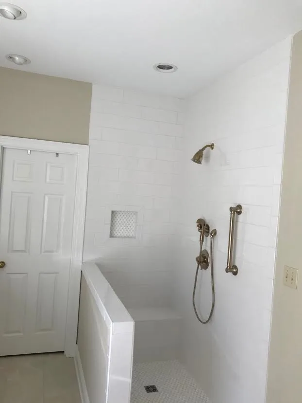 Light-Colored Bathroom - Shower and Bathtub by Northshore Renovations - Photo 2