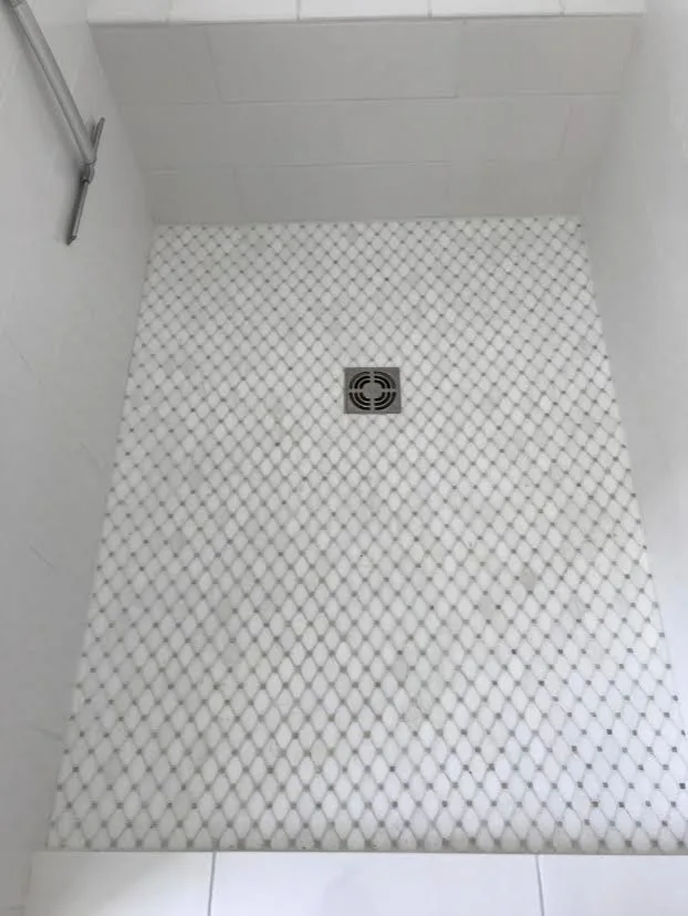 Light-Colored Bathroom - Shower and Bathtub by Northshore Renovations - Photo 5