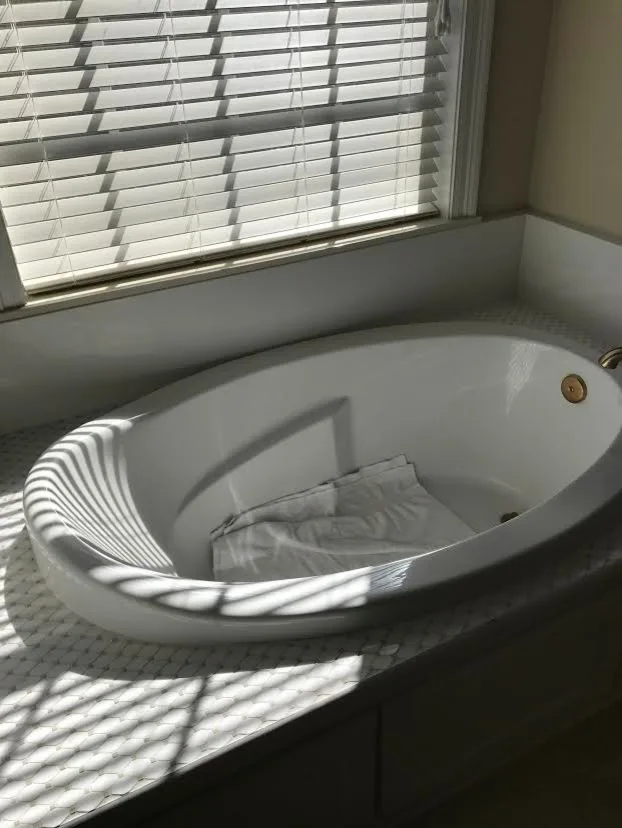Light-Colored Bathroom - Shower and Bathtub by Northshore Renovations - Photo 8