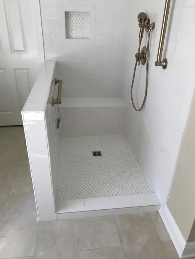 Light-Colored Bathroom - Shower and Bathtub by Northshore Renovations - Photo 10