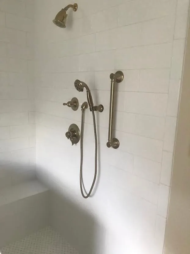 Light-Colored Bathroom - Shower and Bathtub by Northshore Renovations - Photo 6