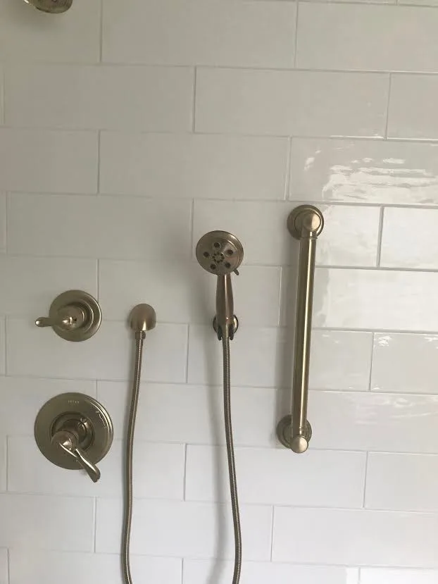 Light-Colored Bathroom - Shower and Bathtub by Northshore Renovations - Photo 7