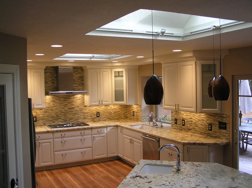 Kitchen with White Cabinets by SBC Contractors - Photo 3