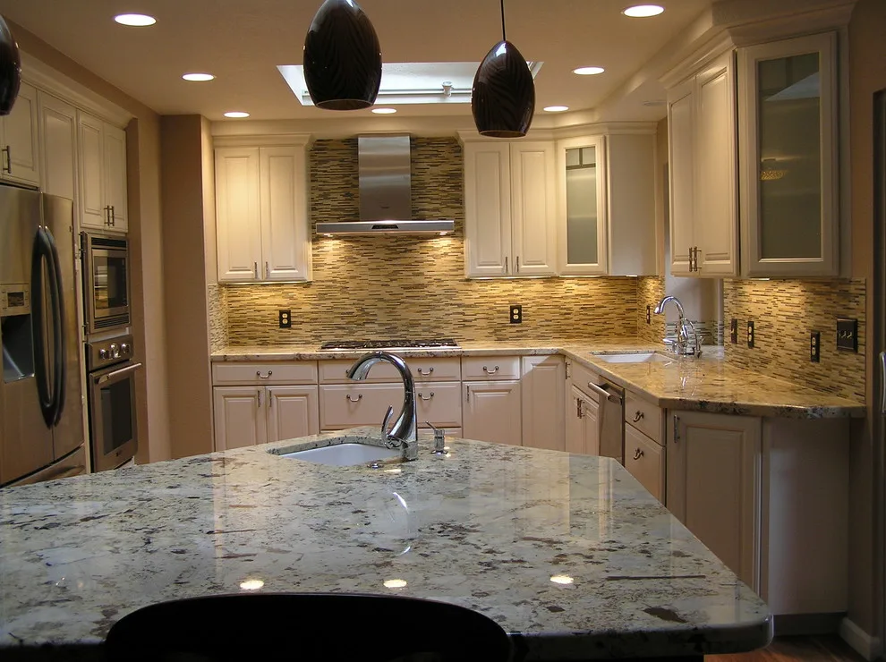 Kitchen with White Cabinets by SBC Contractors - Photo 6
