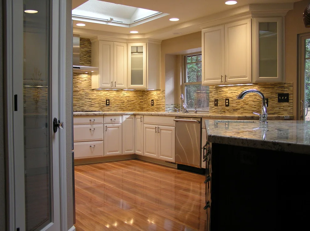 Kitchen with White Cabinets by SBC Contractors - Photo 8
