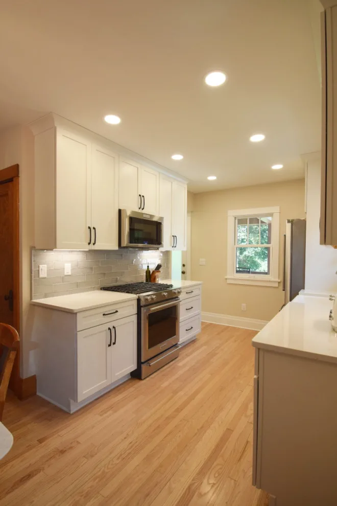 White Gourmet Kitchen by Edge Construction - Photo 4