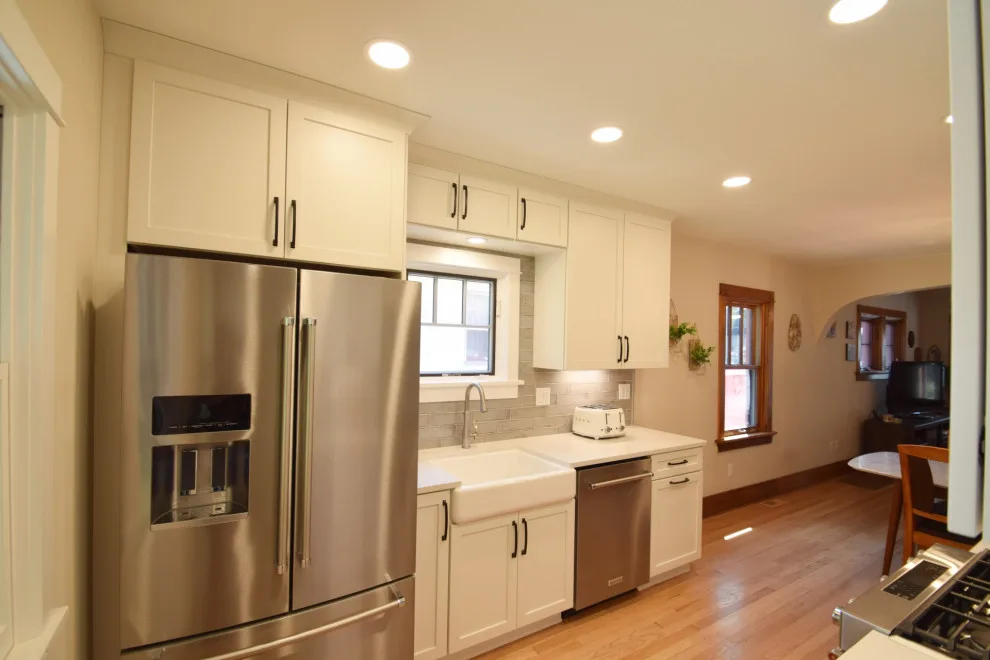 White Gourmet Kitchen by Edge Construction - Photo 11