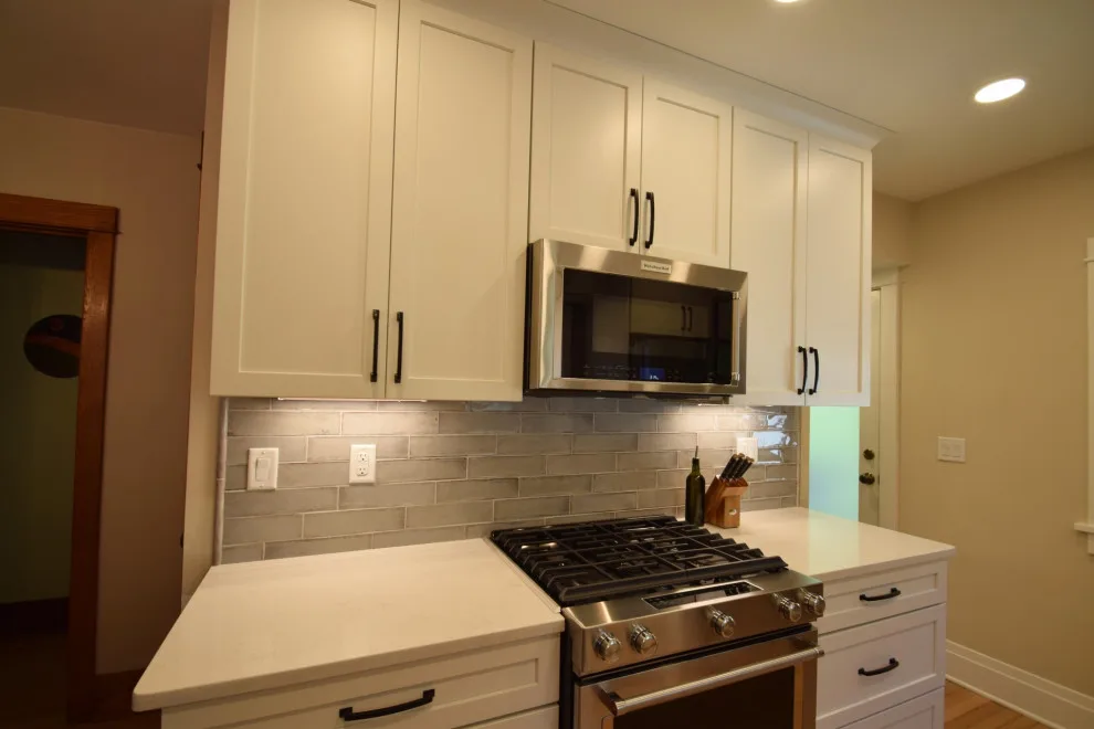 White Gourmet Kitchen by Edge Construction - Photo 5