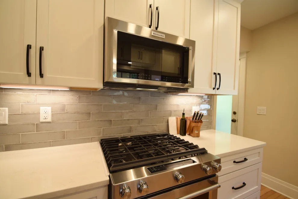White Gourmet Kitchen by Edge Construction - Photo 6