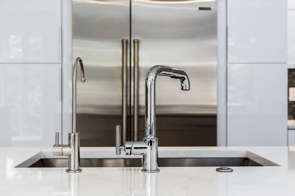 Glossy White Cabinets with White Countertop by Boss Design Center - Photo 11