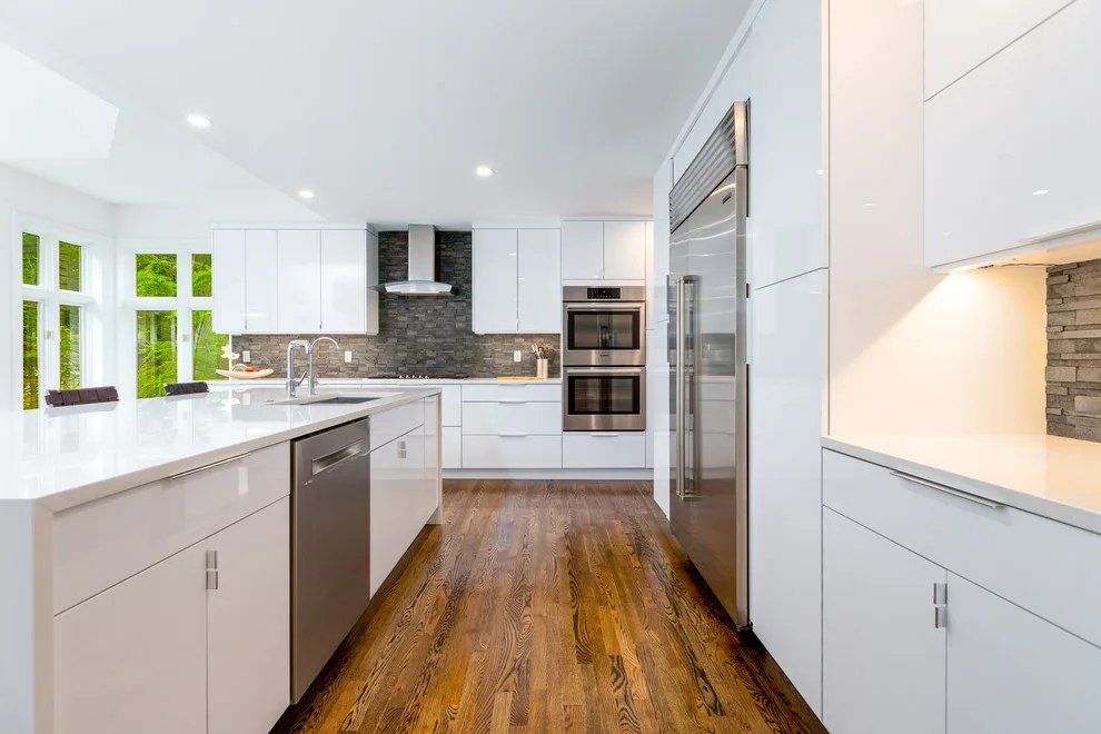 Glossy White Cabinets with White Countertop by Boss Design Center - Photo 5