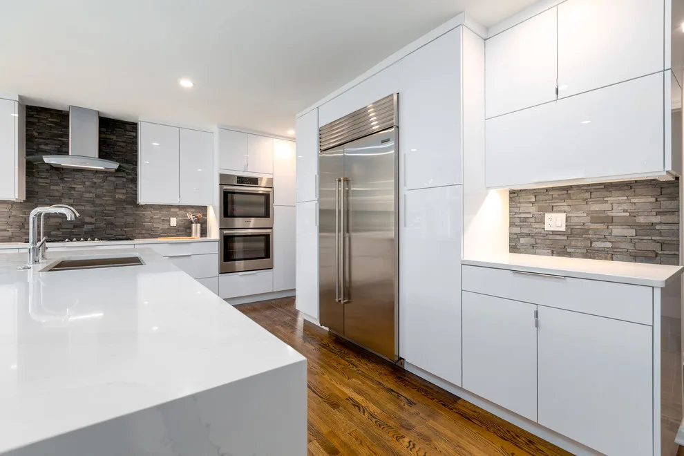 Glossy White Cabinets with White Countertop by Boss Design Center - Photo 2
