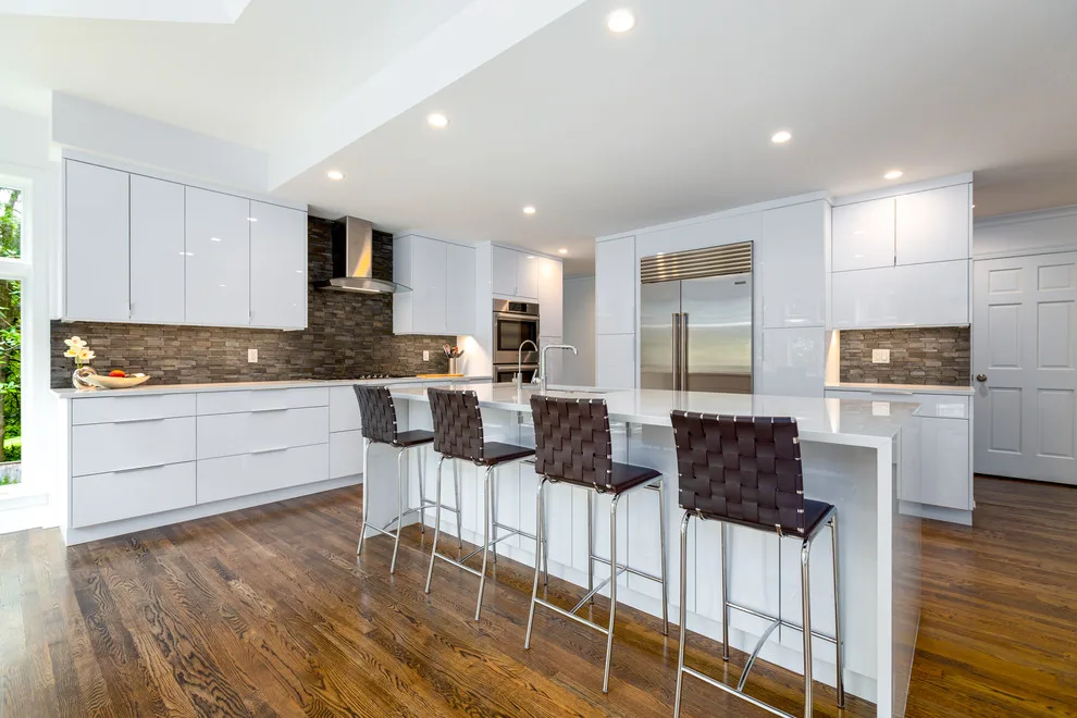 Glossy White Cabinets with White Countertop by Boss Design Center - Photo 8