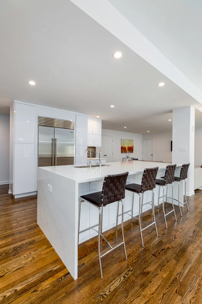 Glossy White Cabinets with White Countertop by Boss Design Center - Photo 6
