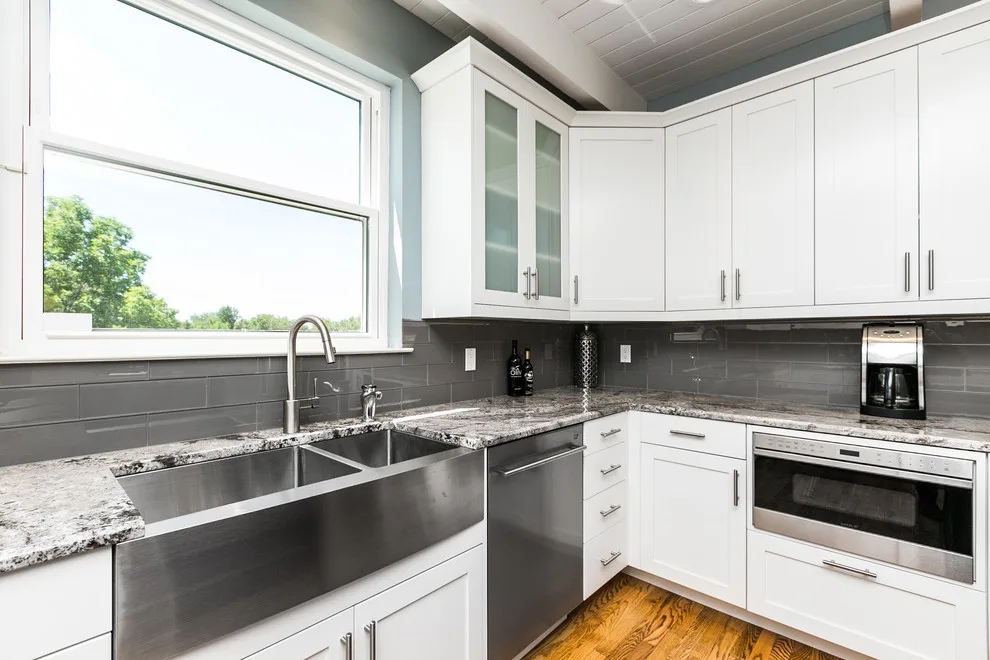 Elegant White Kitchen by More Brothers Construction - Photo 9