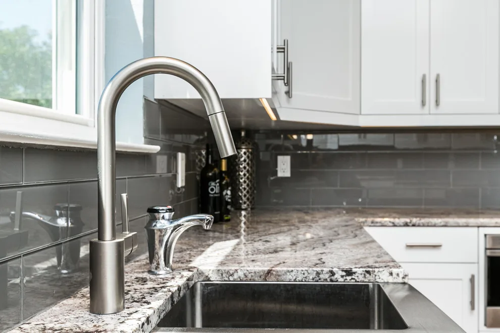 Elegant White Kitchen by More Brothers Construction - Photo 10