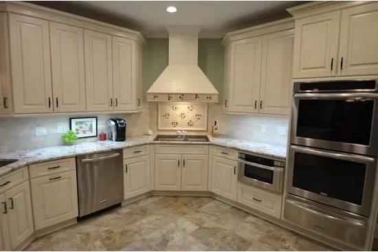 U-Shaped White Kitchen by Conrad Kitchen, Bath And Remodeling LLC - Photo 4